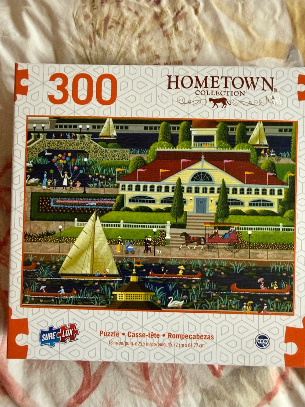 Hometown Collection 300-Piece Puzzle Scenic Harbor “Sunday in the Park”